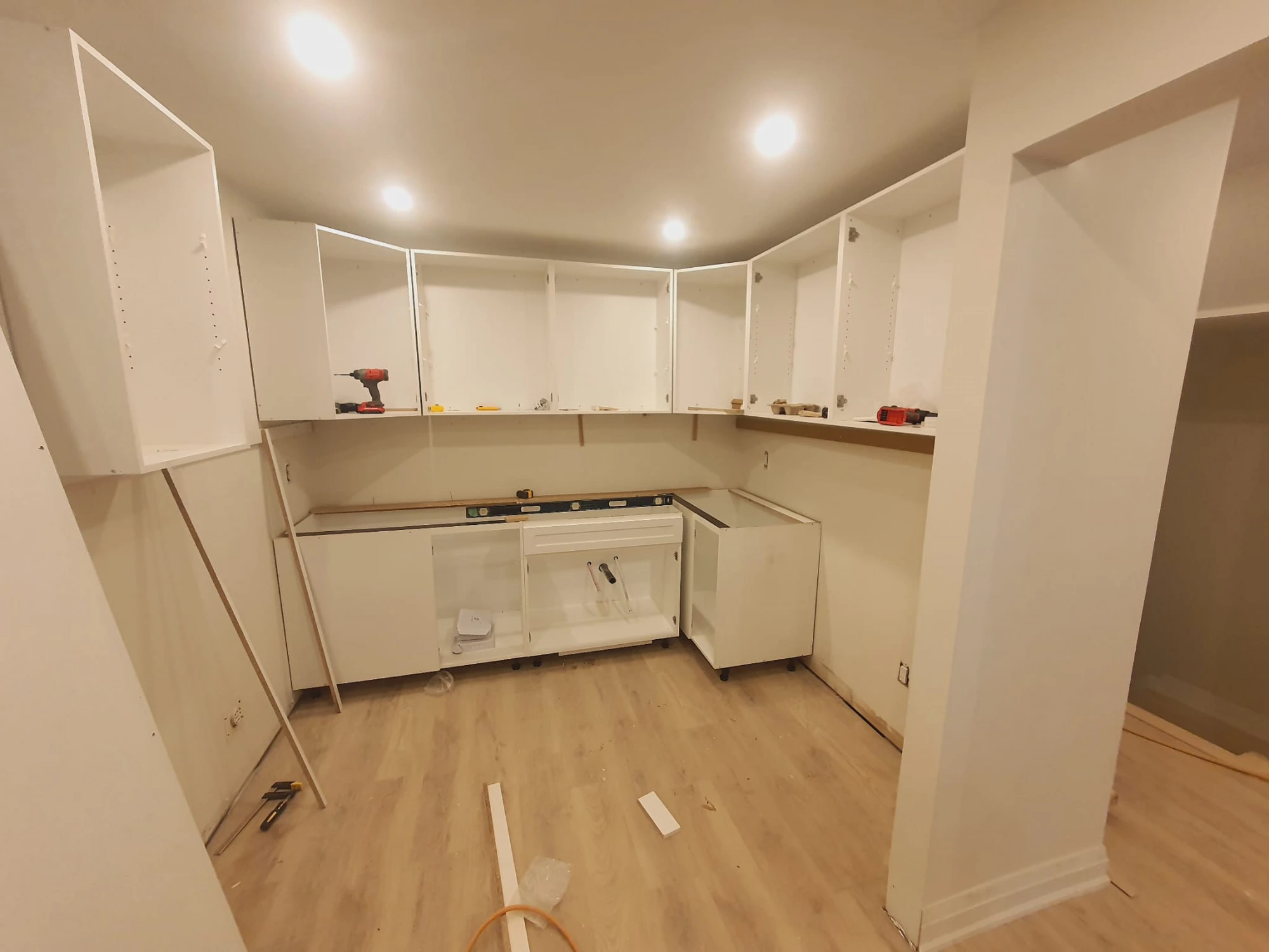 Hive Interiors kitchen cabinets being installed on site