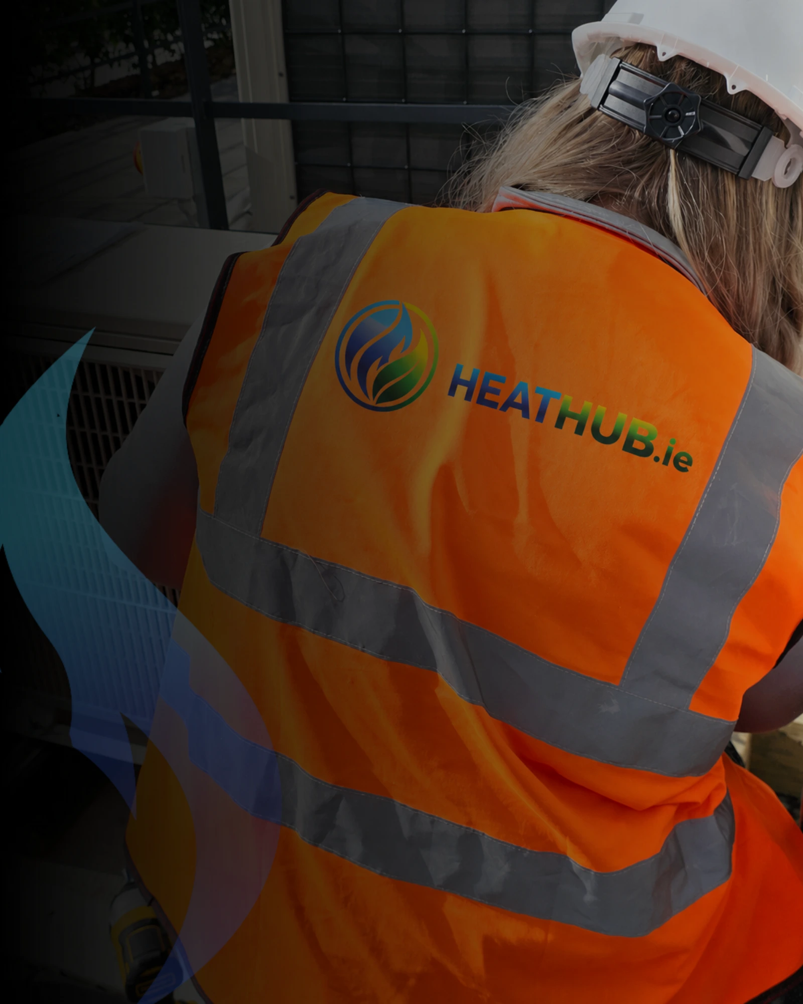 HeatHub.ie engineer in branded hi-vis on site in Dublin
