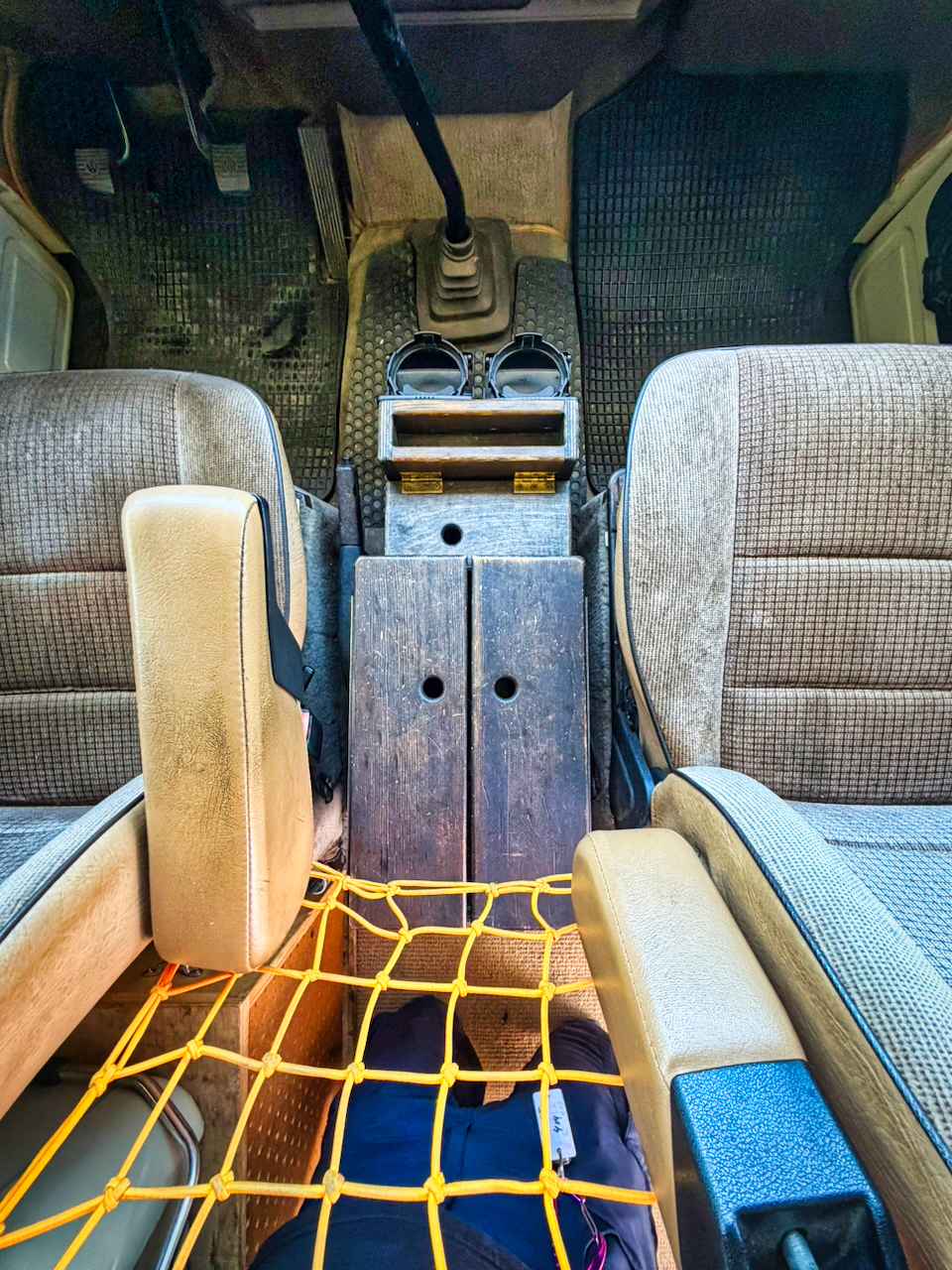 Custom center console with cup holders and cargo net