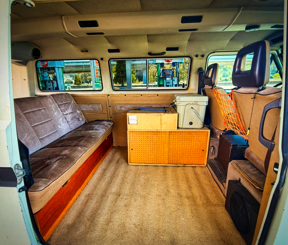 Bench seat, galley cabinet and cooler — the living room